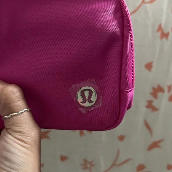 BRAND NEW WITH TAGS! LULULEMON sonic pink/white Wordmark everywhere belt bag